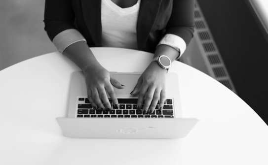woman using MacBook